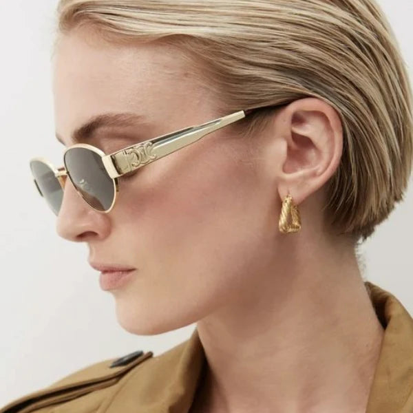 Celine triomphe oval dorado metal cl40235u
